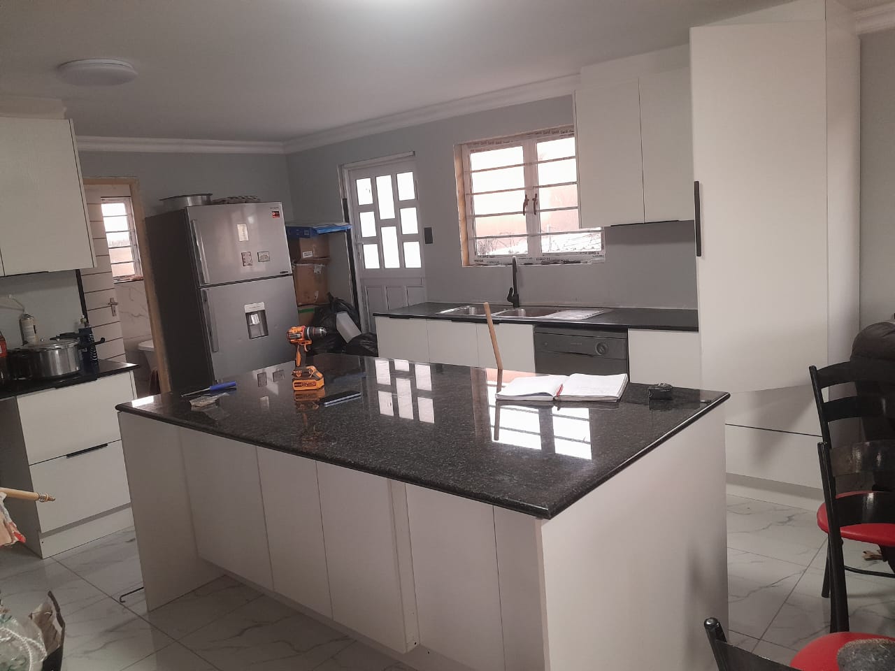 Grey kitchen cabinetry and island
